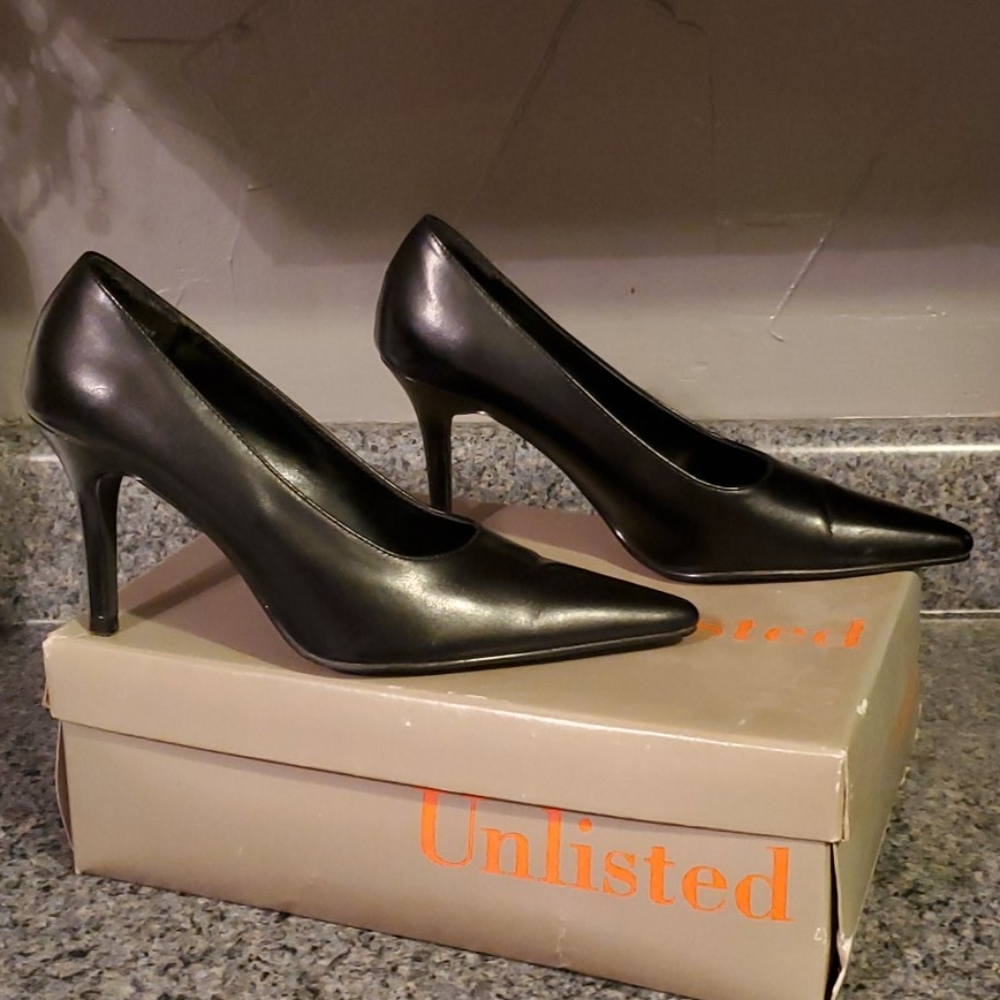 Unlisted black pointy toe heels